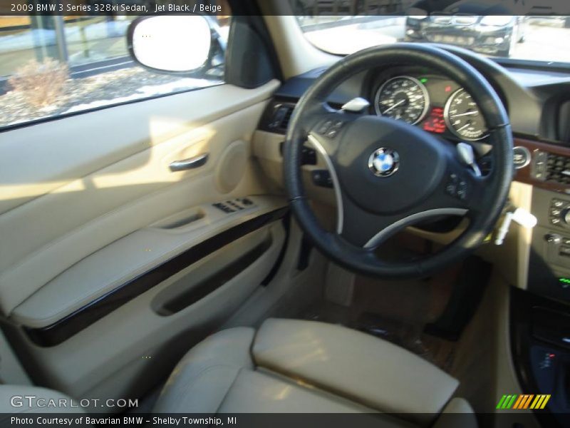 Jet Black / Beige 2009 BMW 3 Series 328xi Sedan