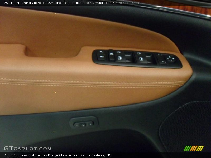 Brilliant Black Crystal Pearl / New Saddle/Black 2011 Jeep Grand Cherokee Overland 4x4