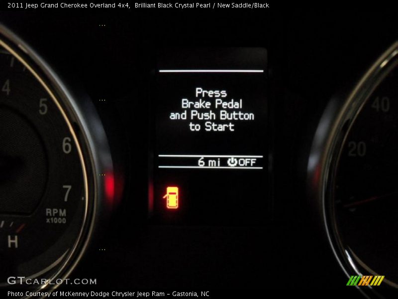 Brilliant Black Crystal Pearl / New Saddle/Black 2011 Jeep Grand Cherokee Overland 4x4
