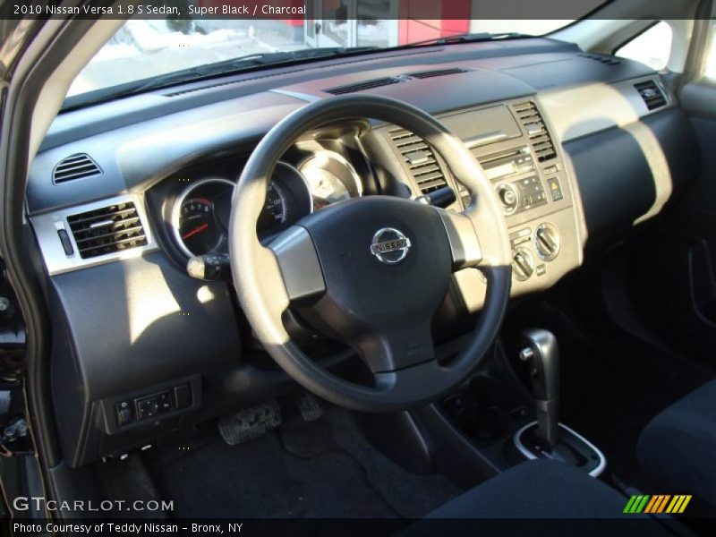 Super Black / Charcoal 2010 Nissan Versa 1.8 S Sedan