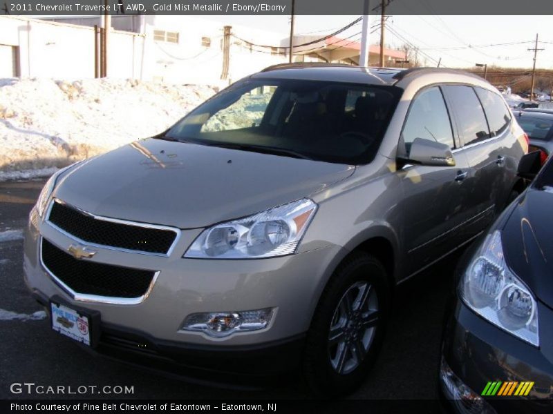 Gold Mist Metallic / Ebony/Ebony 2011 Chevrolet Traverse LT AWD