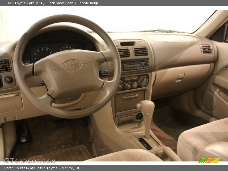 Black Sand Pearl / Pebble Beige 2002 Toyota Corolla LE