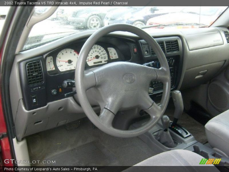 Impulse Red Pearl / Charcoal 2002 Toyota Tacoma V6 TRD Xtracab 4x4