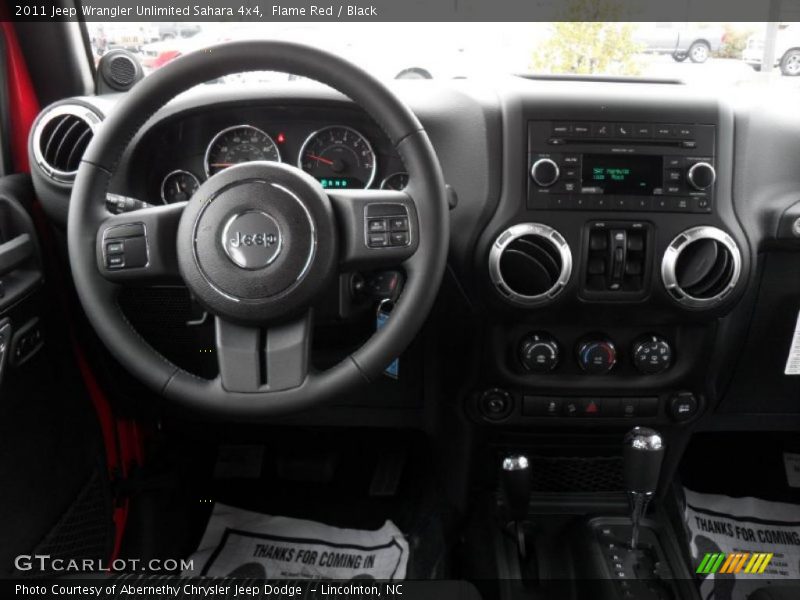 Dashboard of 2011 Wrangler Unlimited Sahara 4x4