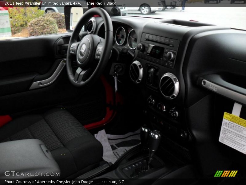 Flame Red / Black 2011 Jeep Wrangler Unlimited Sahara 4x4