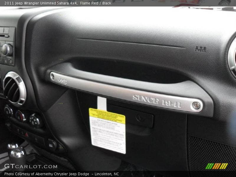 Flame Red / Black 2011 Jeep Wrangler Unlimited Sahara 4x4