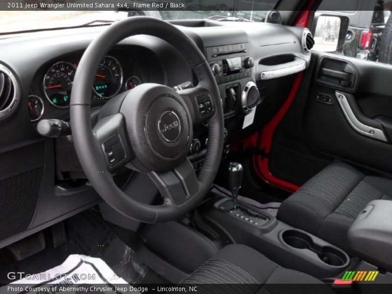 Flame Red / Black 2011 Jeep Wrangler Unlimited Sahara 4x4