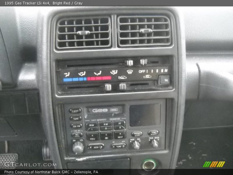 Bright Red / Gray 1995 Geo Tracker LSi 4x4