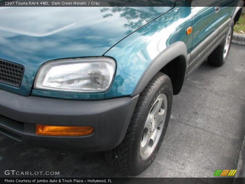 Dark Green Metallic / Gray 1997 Toyota RAV4 4WD