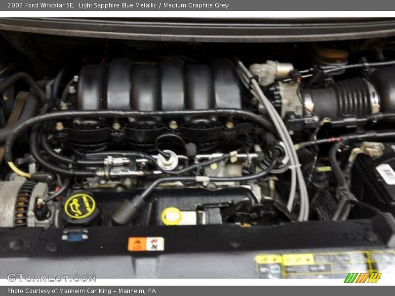 Light Sapphire Blue Metallic / Medium Graphite Grey 2002 Ford Windstar SE