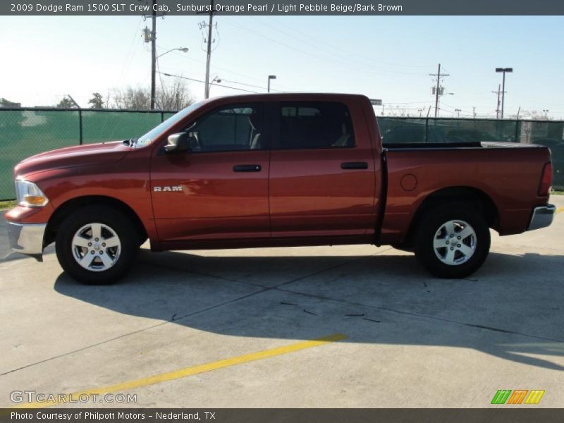 Sunburst Orange Pearl / Light Pebble Beige/Bark Brown 2009 Dodge Ram 1500 SLT Crew Cab