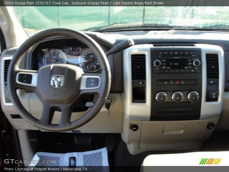 Sunburst Orange Pearl / Light Pebble Beige/Bark Brown 2009 Dodge Ram 1500 SLT Crew Cab