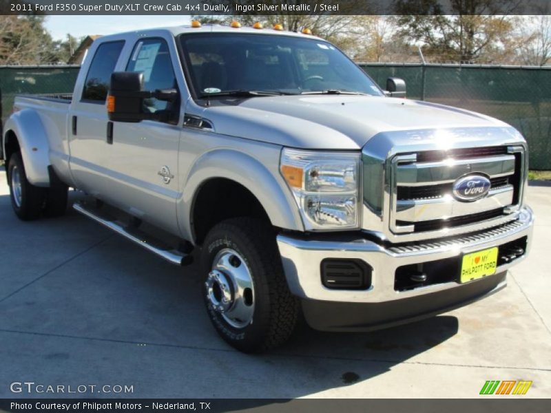 Front 3/4 View of 2011 F350 Super Duty XLT Crew Cab 4x4 Dually