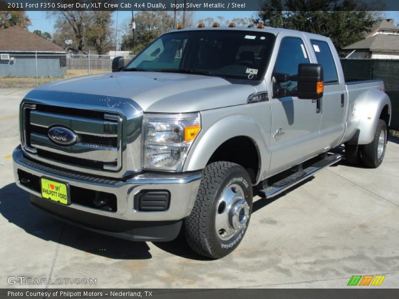 Front 3/4 View of 2011 F350 Super Duty XLT Crew Cab 4x4 Dually