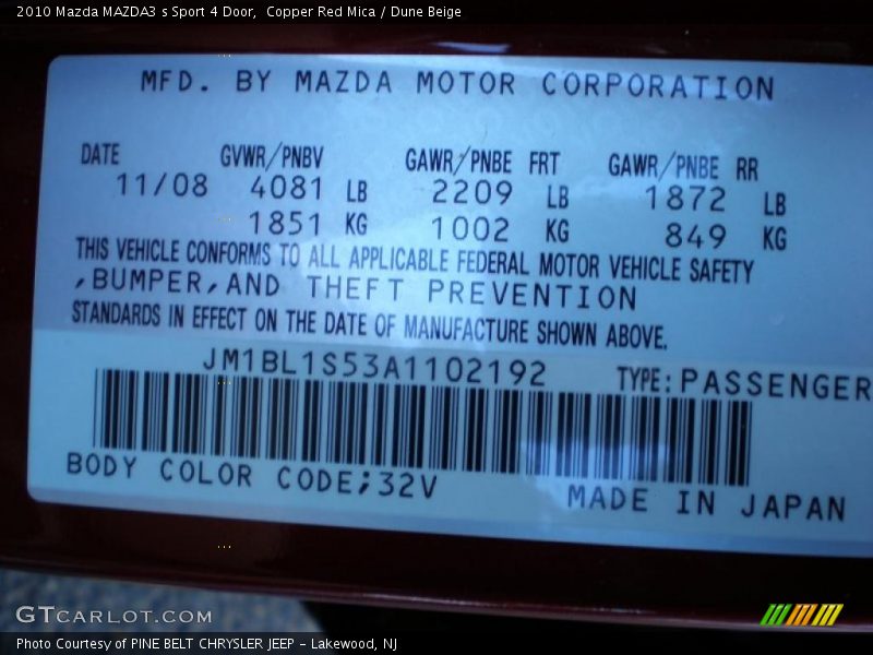 Copper Red Mica / Dune Beige 2010 Mazda MAZDA3 s Sport 4 Door