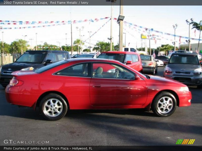 Red Flame Metallic / Ivory 2002 Toyota Solara SE Coupe