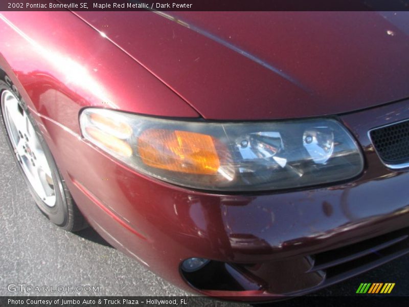 Maple Red Metallic / Dark Pewter 2002 Pontiac Bonneville SE