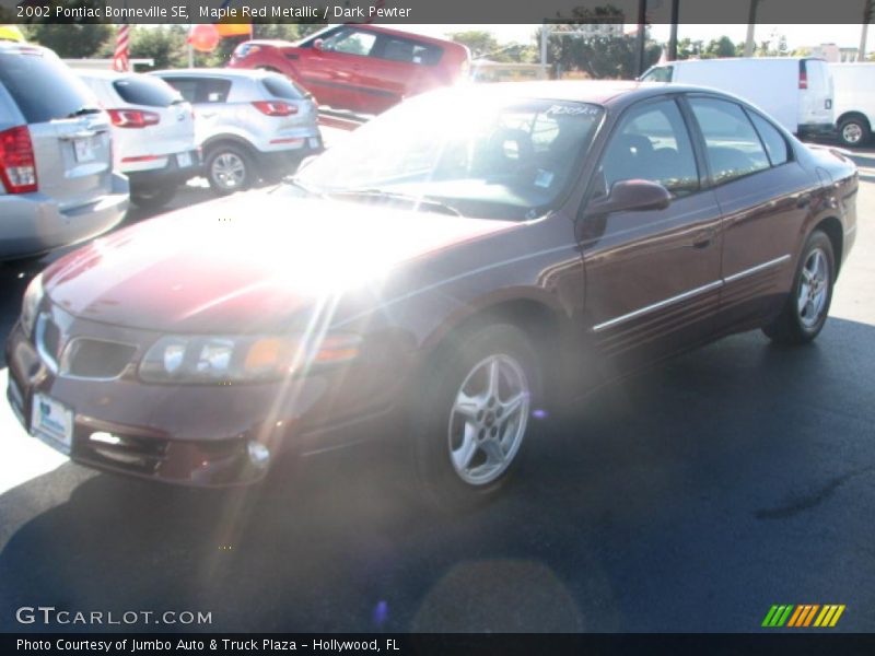 Maple Red Metallic / Dark Pewter 2002 Pontiac Bonneville SE
