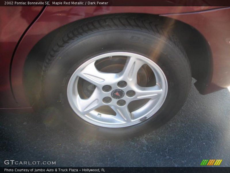 Maple Red Metallic / Dark Pewter 2002 Pontiac Bonneville SE