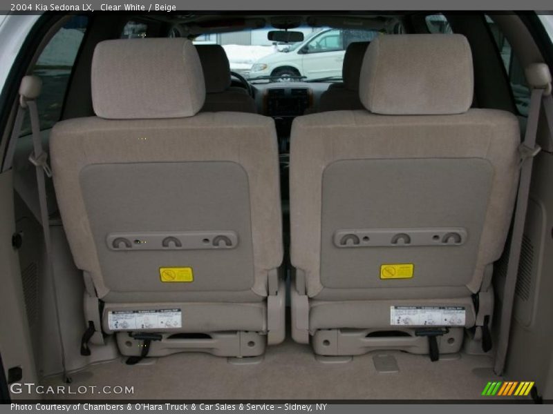 Clear White / Beige 2004 Kia Sedona LX