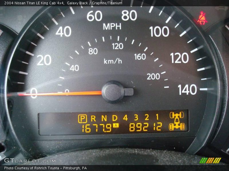 Galaxy Black / Graphite/Titanium 2004 Nissan Titan LE King Cab 4x4