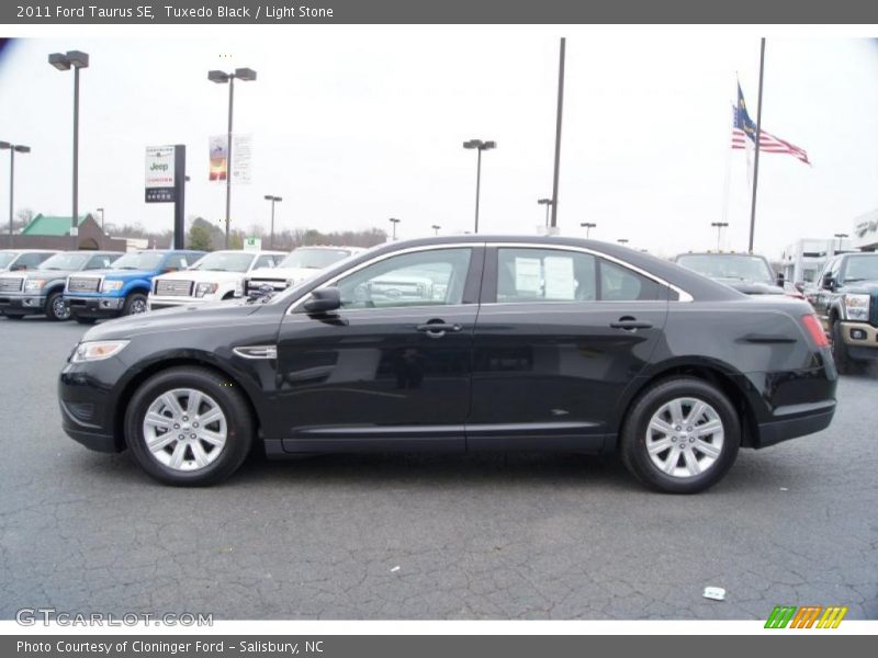 Tuxedo Black / Light Stone 2011 Ford Taurus SE