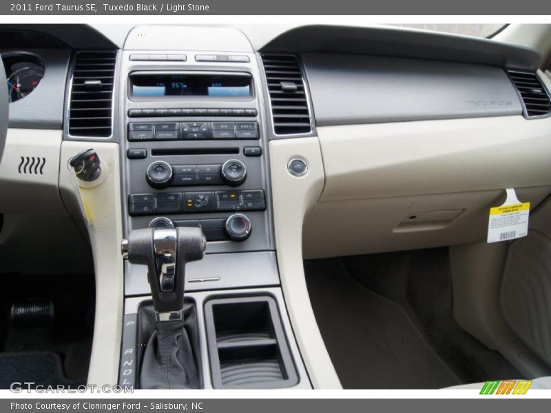 Tuxedo Black / Light Stone 2011 Ford Taurus SE