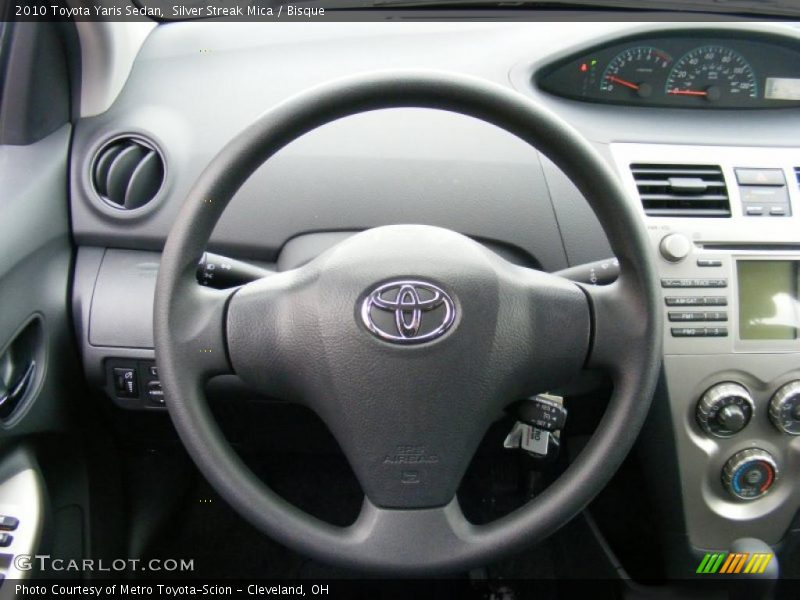 Silver Streak Mica / Bisque 2010 Toyota Yaris Sedan