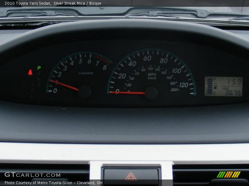 Silver Streak Mica / Bisque 2010 Toyota Yaris Sedan