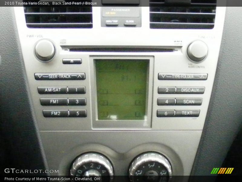 Black Sand Pearl / Bisque 2010 Toyota Yaris Sedan