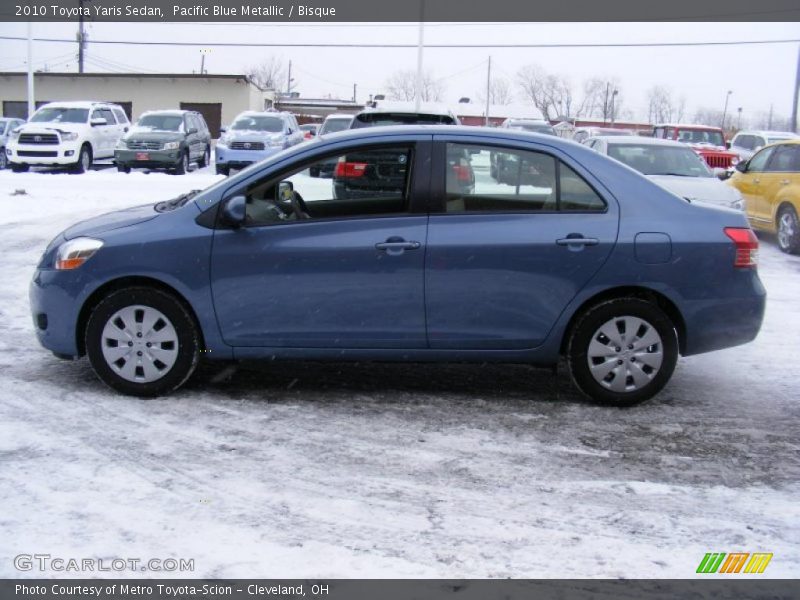 Pacific Blue Metallic / Bisque 2010 Toyota Yaris Sedan