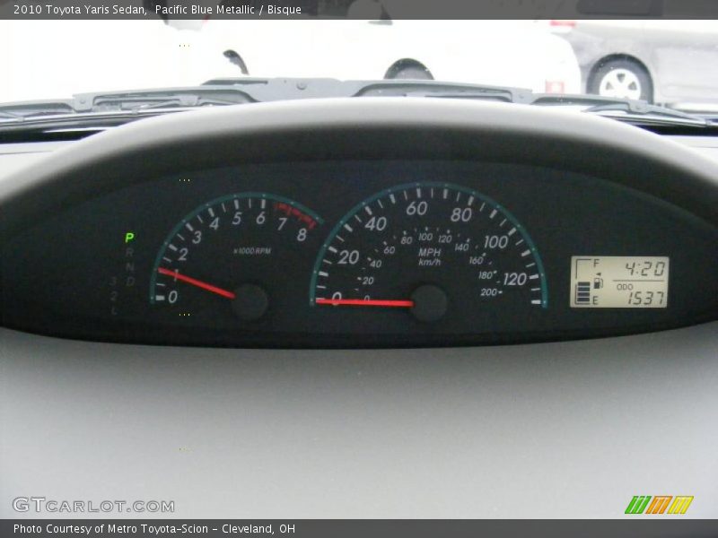Pacific Blue Metallic / Bisque 2010 Toyota Yaris Sedan