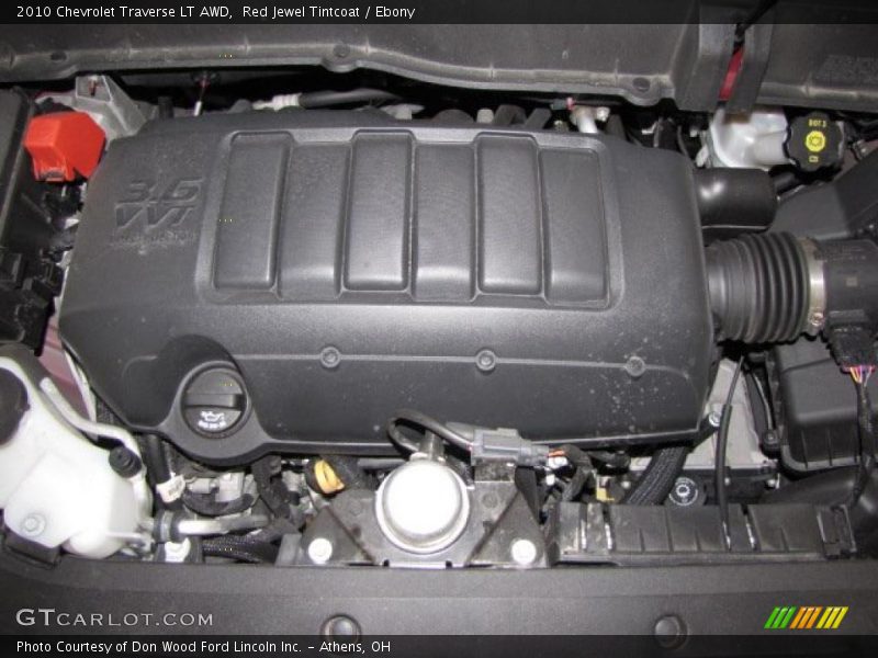 Red Jewel Tintcoat / Ebony 2010 Chevrolet Traverse LT AWD