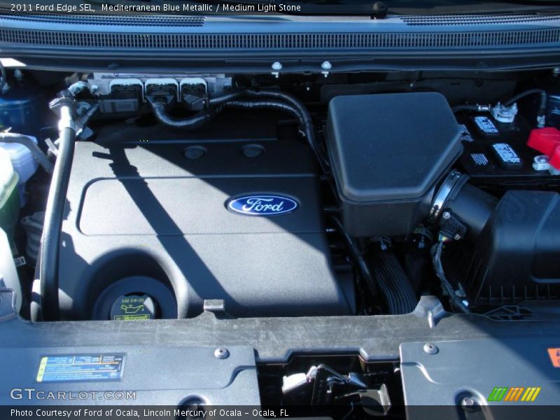 Mediterranean Blue Metallic / Medium Light Stone 2011 Ford Edge SEL