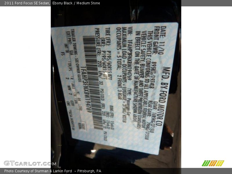 Ebony Black / Medium Stone 2011 Ford Focus SE Sedan