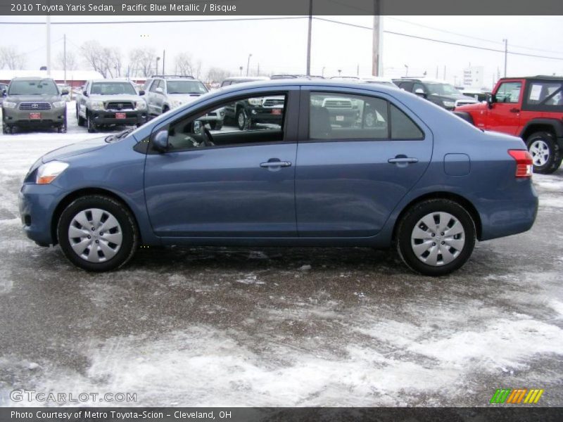 Pacific Blue Metallic / Bisque 2010 Toyota Yaris Sedan