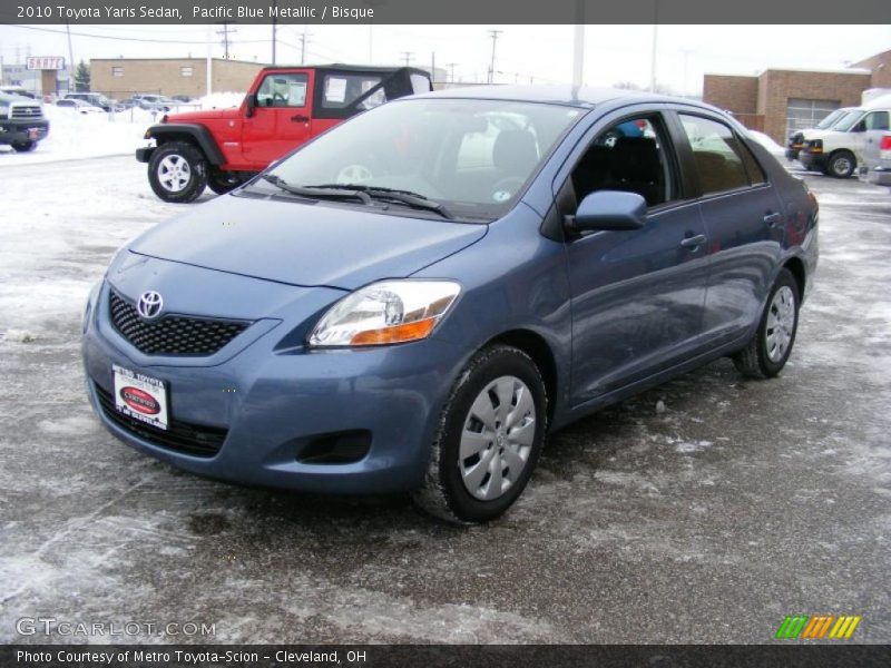 Pacific Blue Metallic / Bisque 2010 Toyota Yaris Sedan
