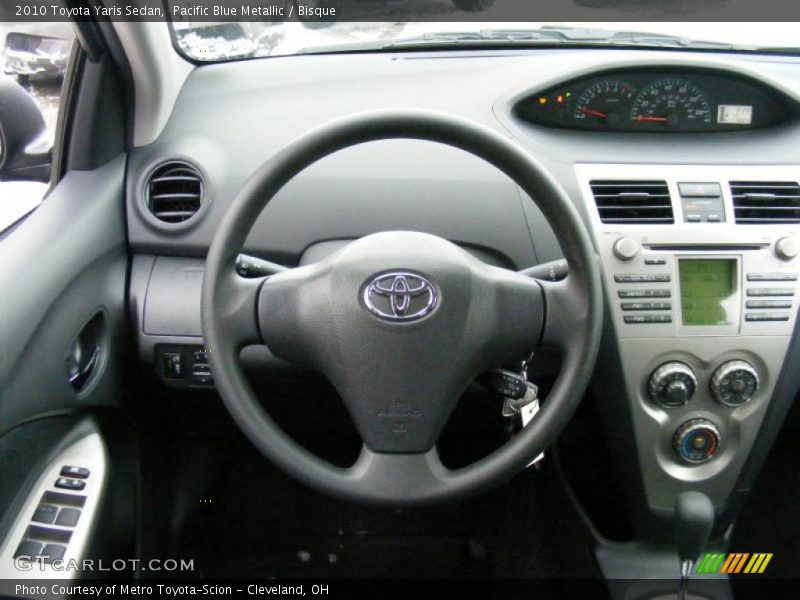 Pacific Blue Metallic / Bisque 2010 Toyota Yaris Sedan