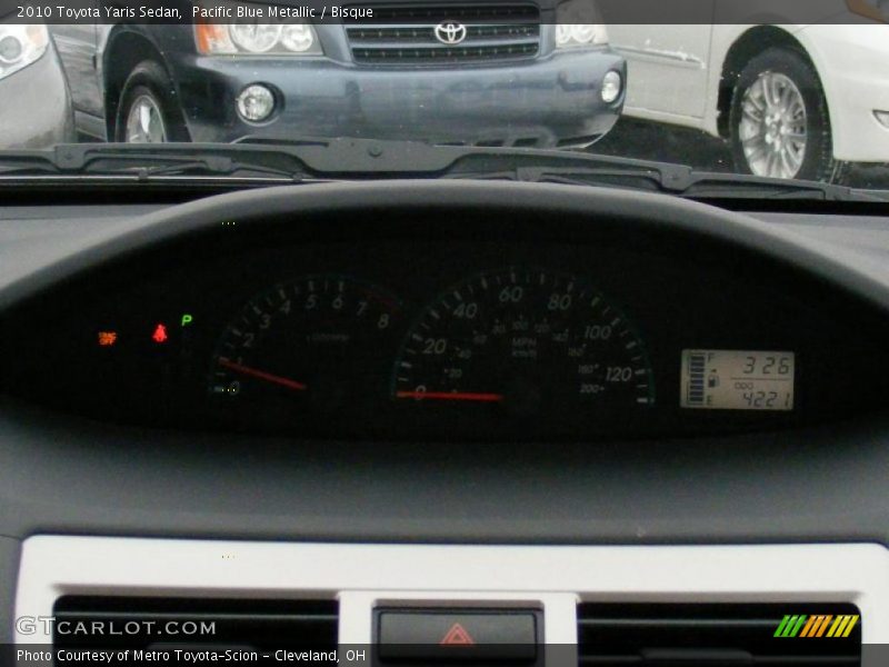 Pacific Blue Metallic / Bisque 2010 Toyota Yaris Sedan