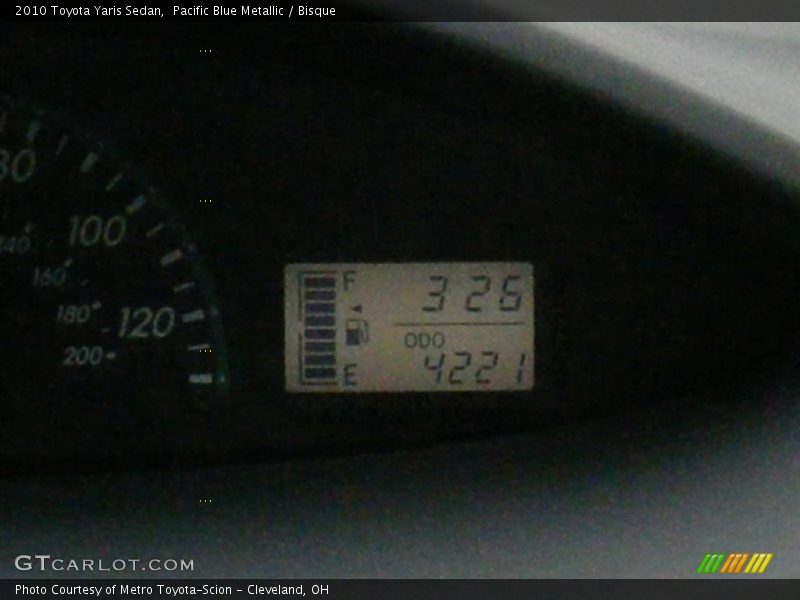 Pacific Blue Metallic / Bisque 2010 Toyota Yaris Sedan