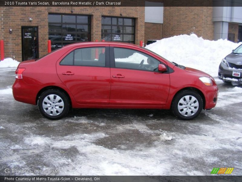 Barcelona Red Metallic / Dark Charcoal 2010 Toyota Yaris Sedan