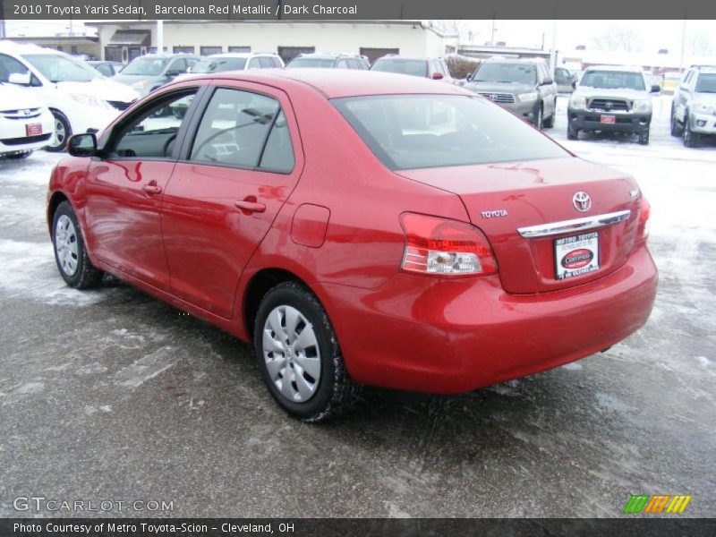 Barcelona Red Metallic / Dark Charcoal 2010 Toyota Yaris Sedan