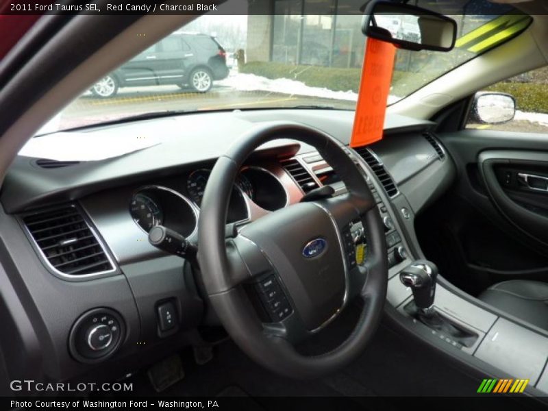 Red Candy / Charcoal Black 2011 Ford Taurus SEL