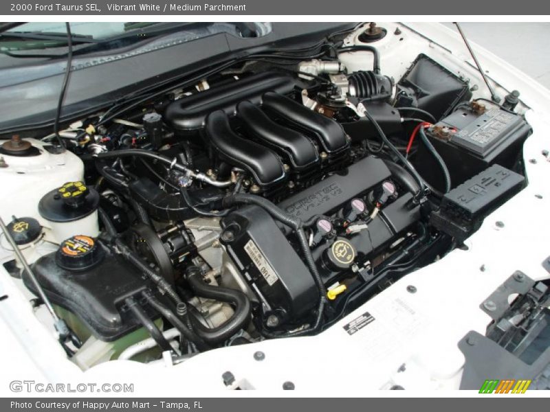 Vibrant White / Medium Parchment 2000 Ford Taurus SEL