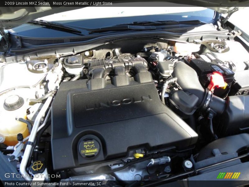 Moss Green Metallic / Light Stone 2009 Lincoln MKZ Sedan