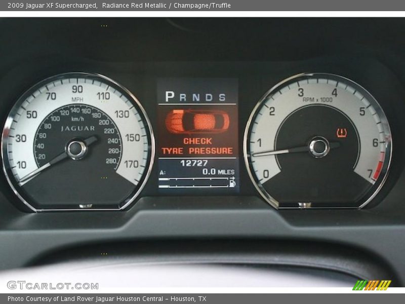 Radiance Red Metallic / Champagne/Truffle 2009 Jaguar XF Supercharged