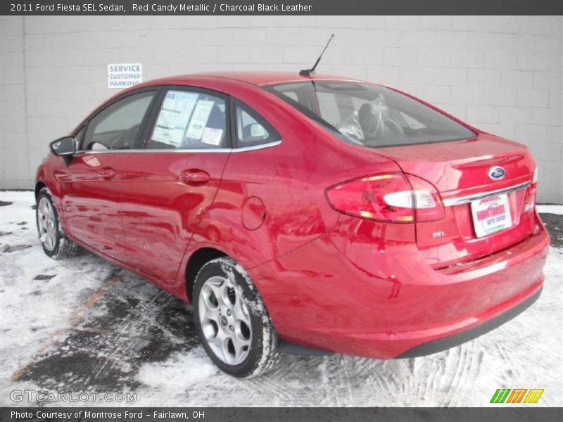 Red Candy Metallic / Charcoal Black Leather 2011 Ford Fiesta SEL Sedan