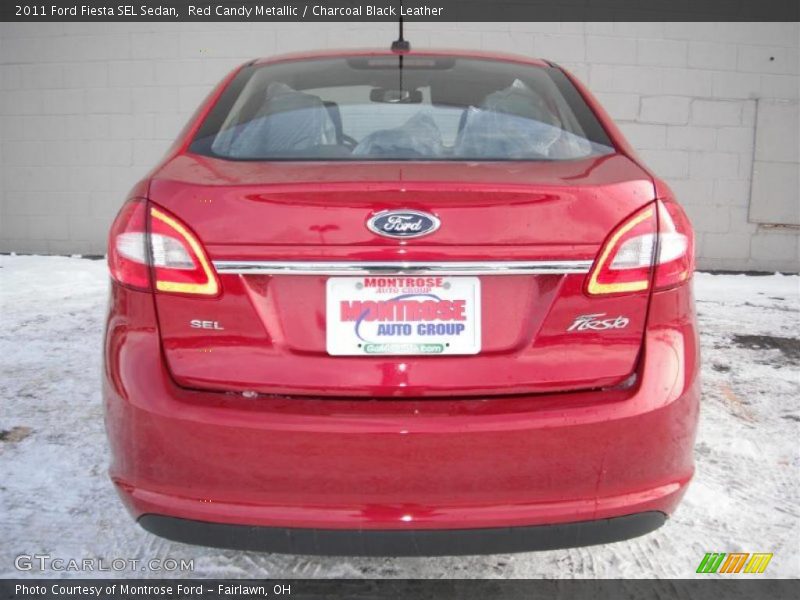 Red Candy Metallic / Charcoal Black Leather 2011 Ford Fiesta SEL Sedan