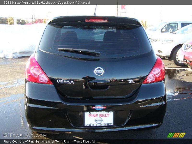 Super Black / Charcoal 2011 Nissan Versa 1.8 SL Hatchback