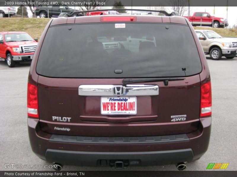 Dark Cherry Pearl / Beige 2009 Honda Pilot Touring 4WD